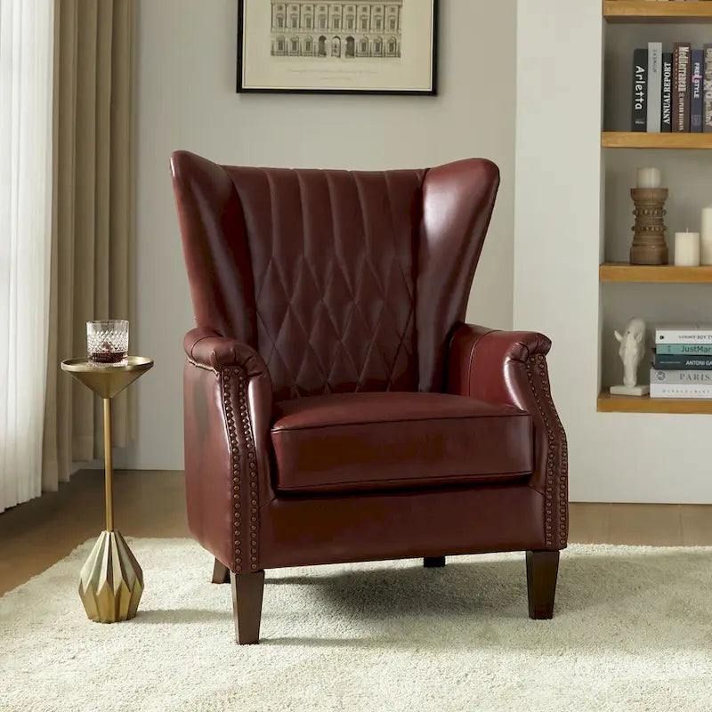 Traditionele fauteuil van echt leer met poten van massief hout