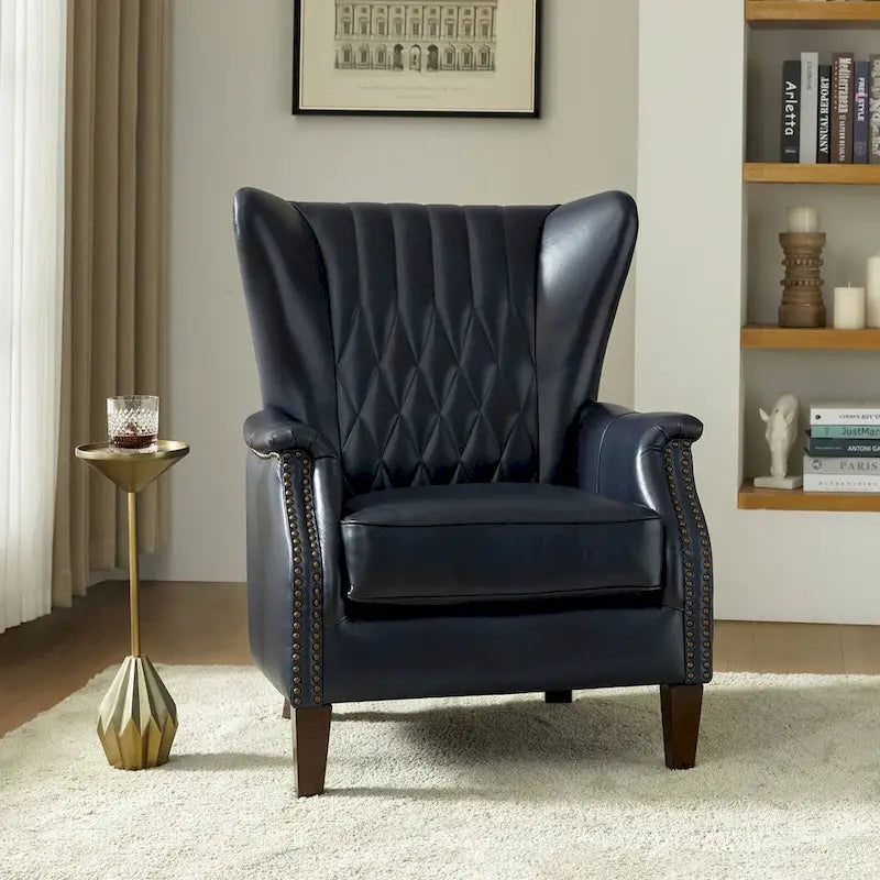 Traditionele fauteuil van echt leer met poten van massief hout
