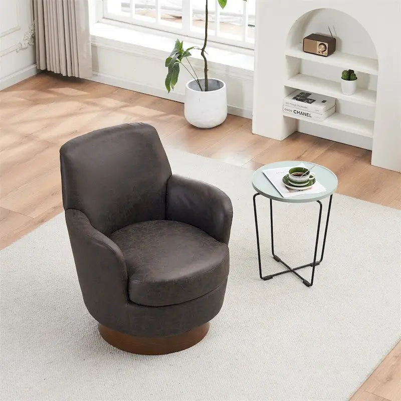 Poltrona decorativa rotonda girevole con base in acciaio inossidabile